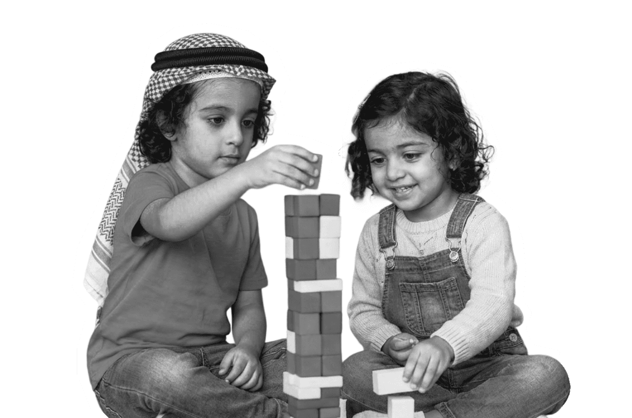 Two children stacking wooden blocks together